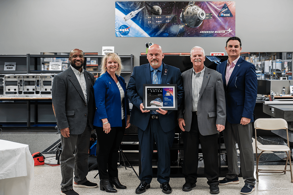Group receiving an award at NASA event